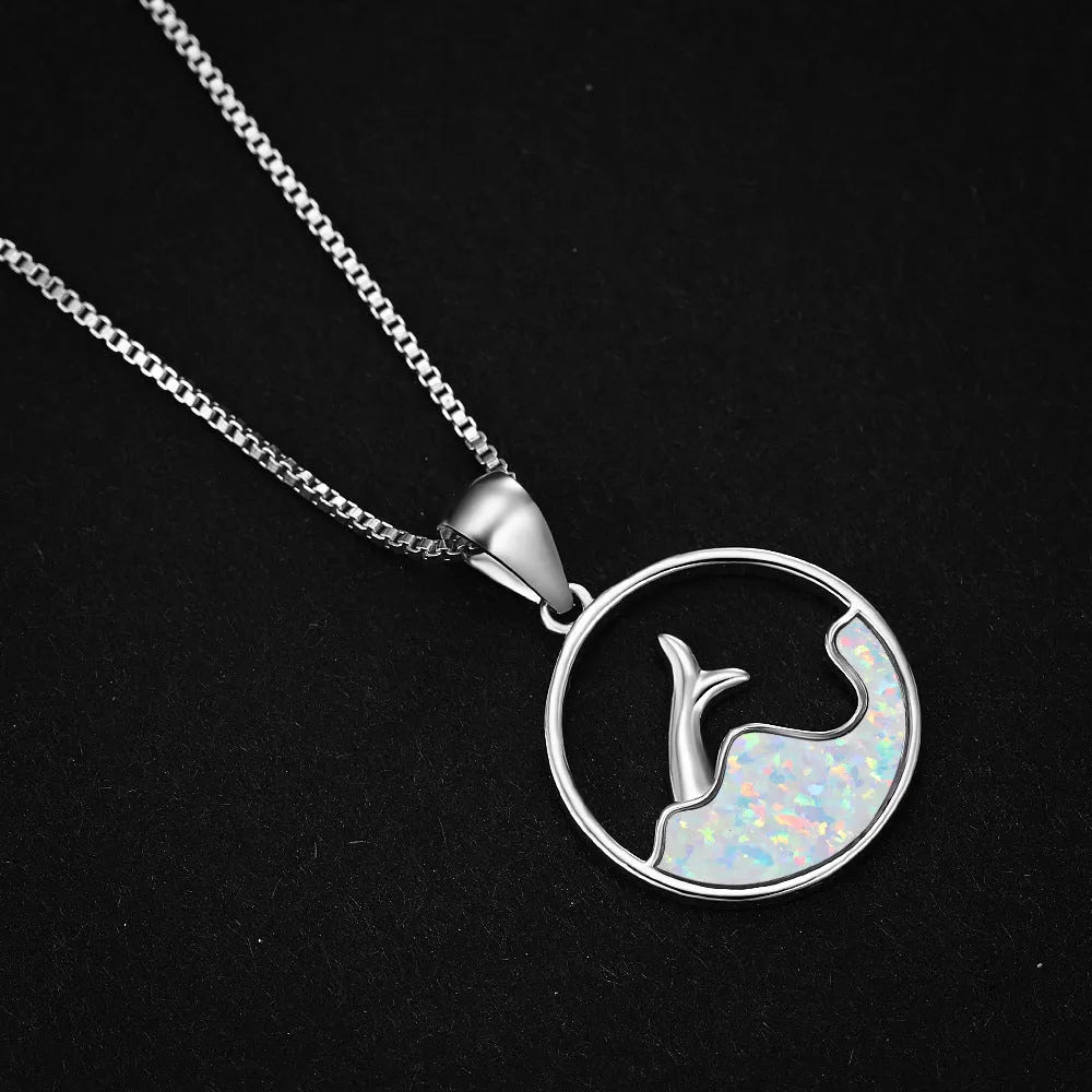 Geometric sea fishtail pendant necklace with electroplated white gold finish and round decorative elements