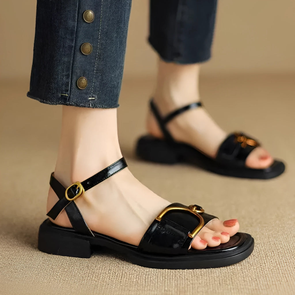 Women's casual leather sandals with thick rubber sole and button closure in black, beige, or brown.
