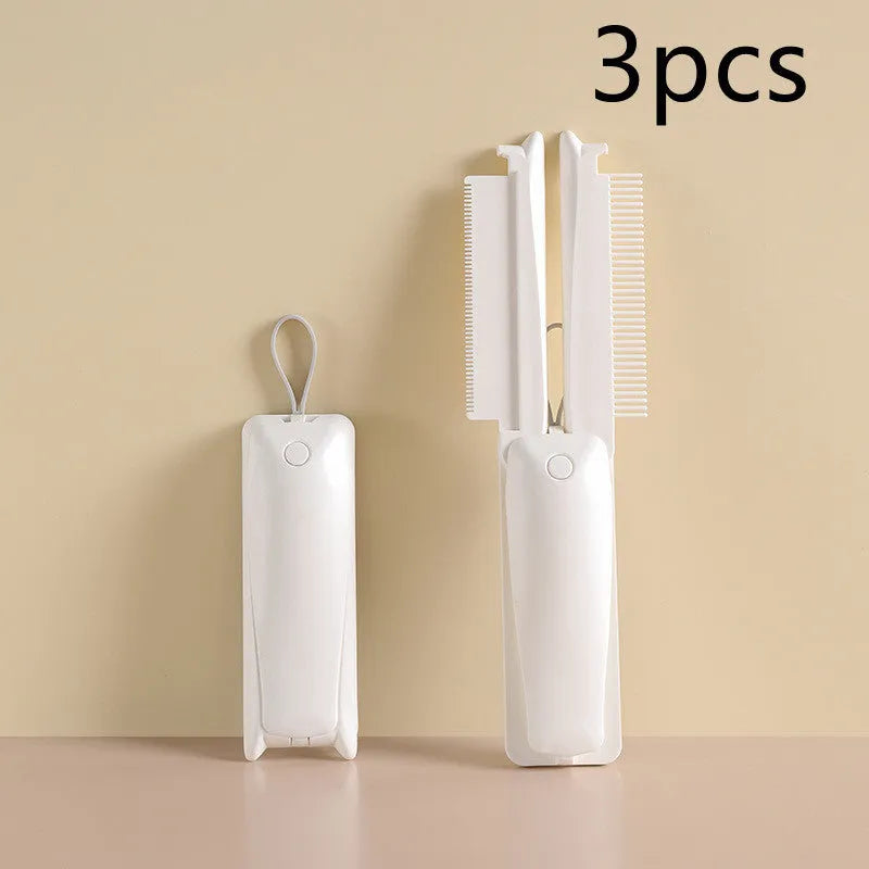 Pink and white ABS plastic pet grooming brush for dogs and cats on flat surface