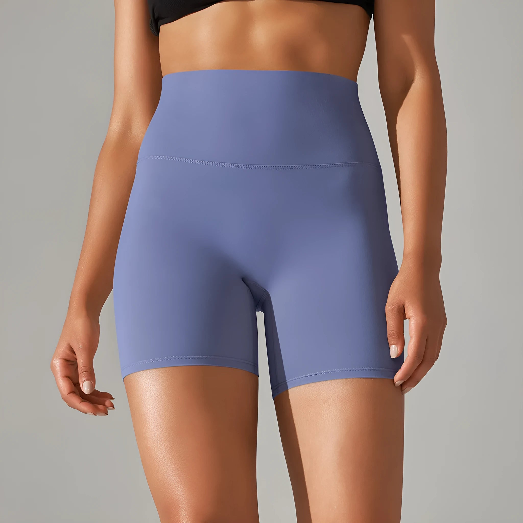 Women's high waist hip lift fitness tights in moisture-wicking fabric for gym and daily wear