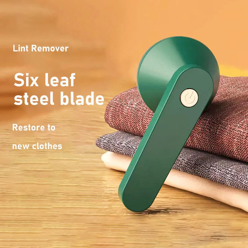USB rechargeable electric lint remover in white with stainless steel blade and honeycomb mesh cover