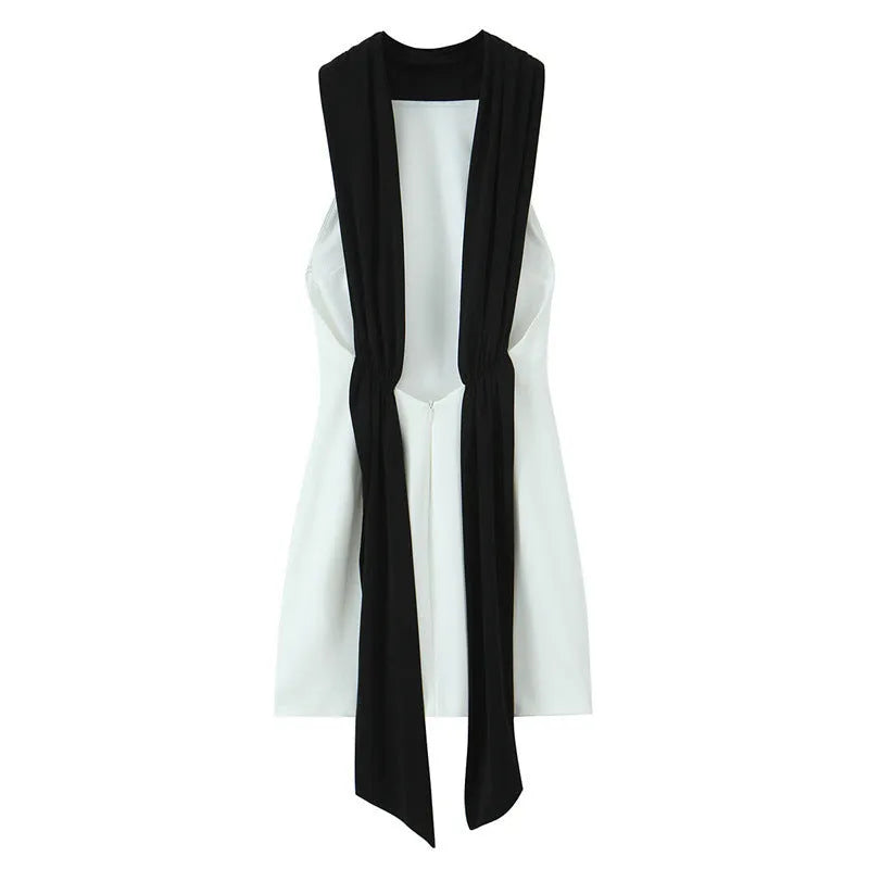 Slim-fitting patchwork short halter dress in black with high waist and asymmetric skirt, polyester fabric, long length