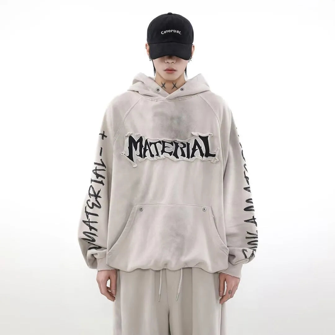 American vintage distressed graffiti hoodie in black loose fit pullover with long sleeves