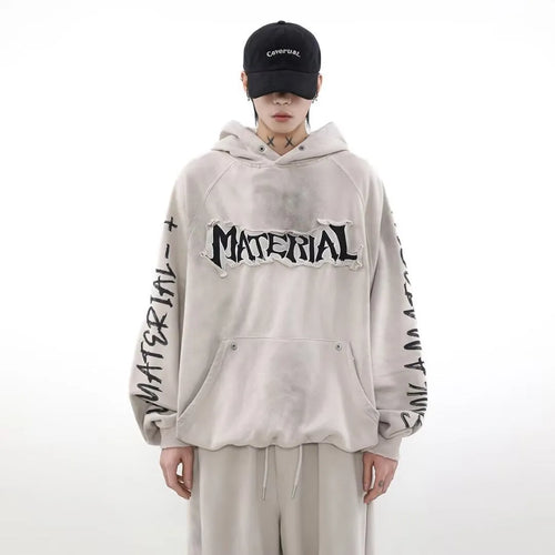American vintage distressed graffiti hoodie in black loose fit pullover with long sleeves