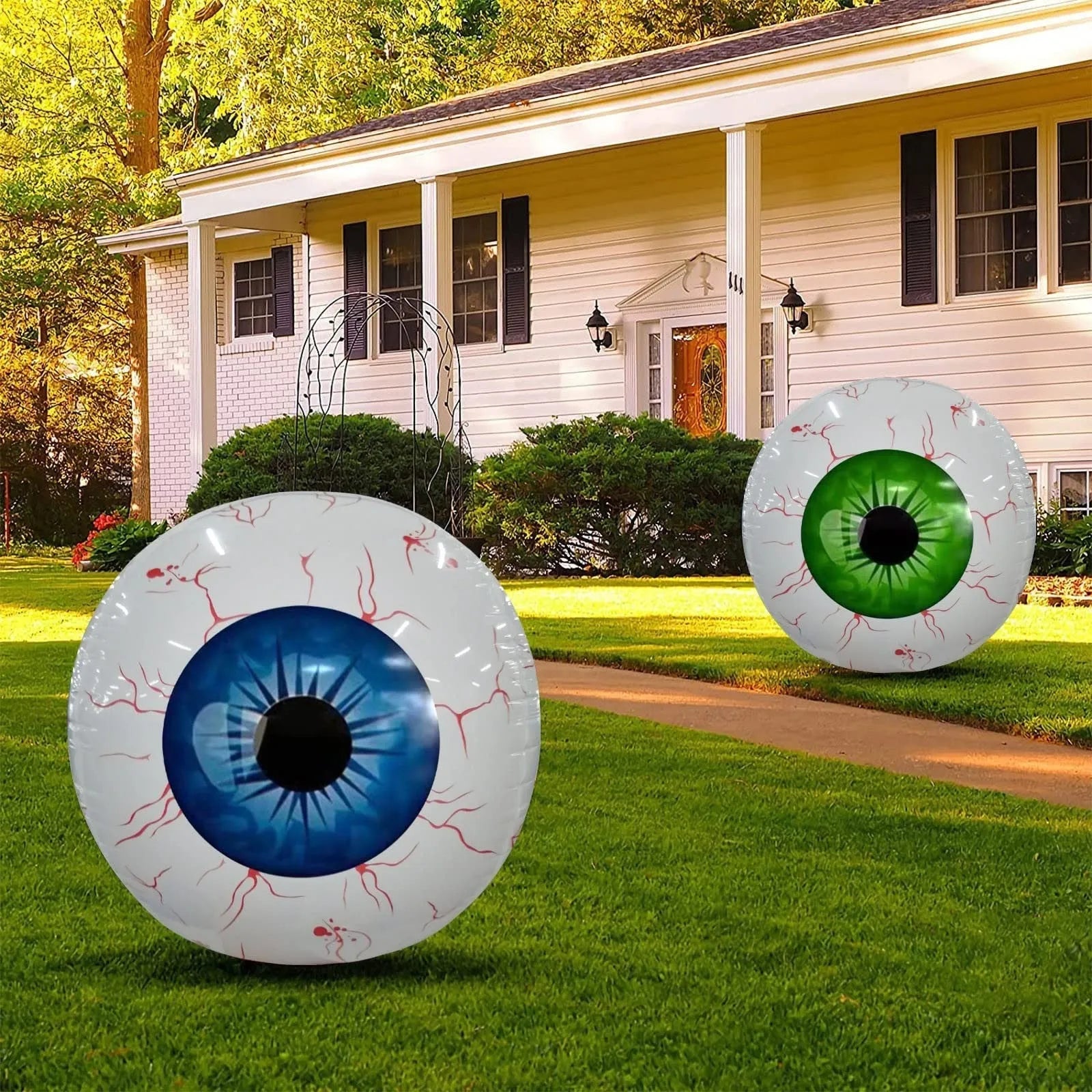Green Halloween balloon with bloodshot eyeball design, shown inflated to 40 cm diameter