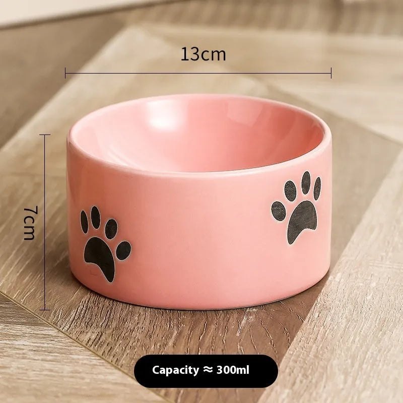 Ceramic cat bowl with high foot design in cat's paw pattern available in multiple colours