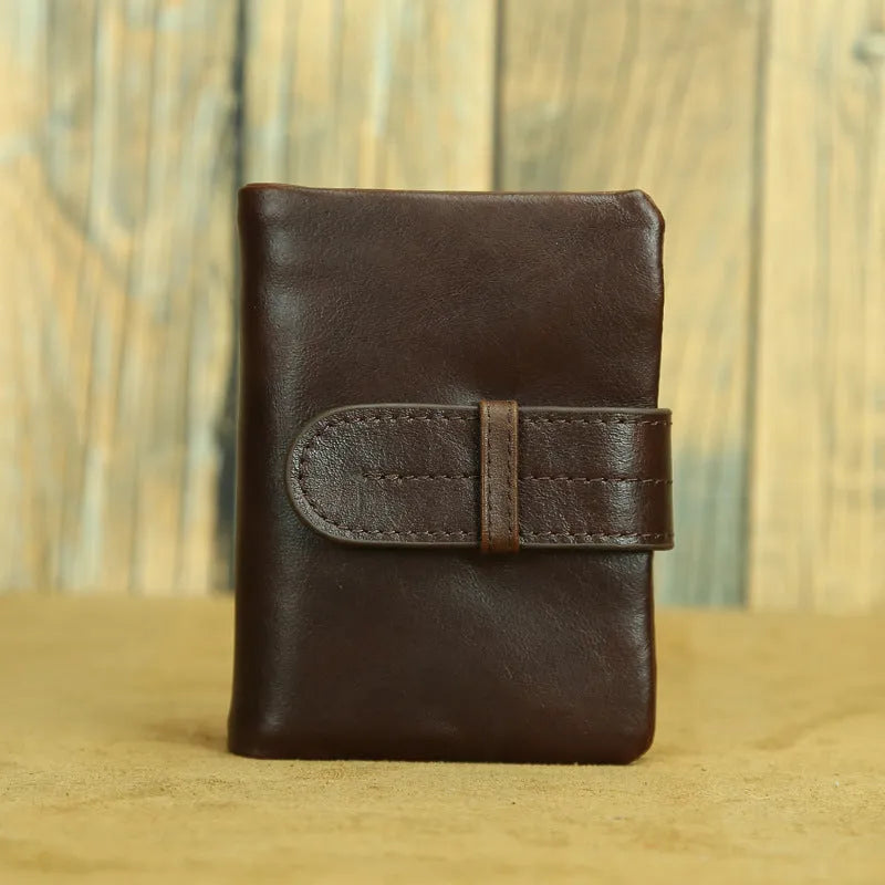 Genuine leather women's wallet in black showing vertical style with multiple card slots