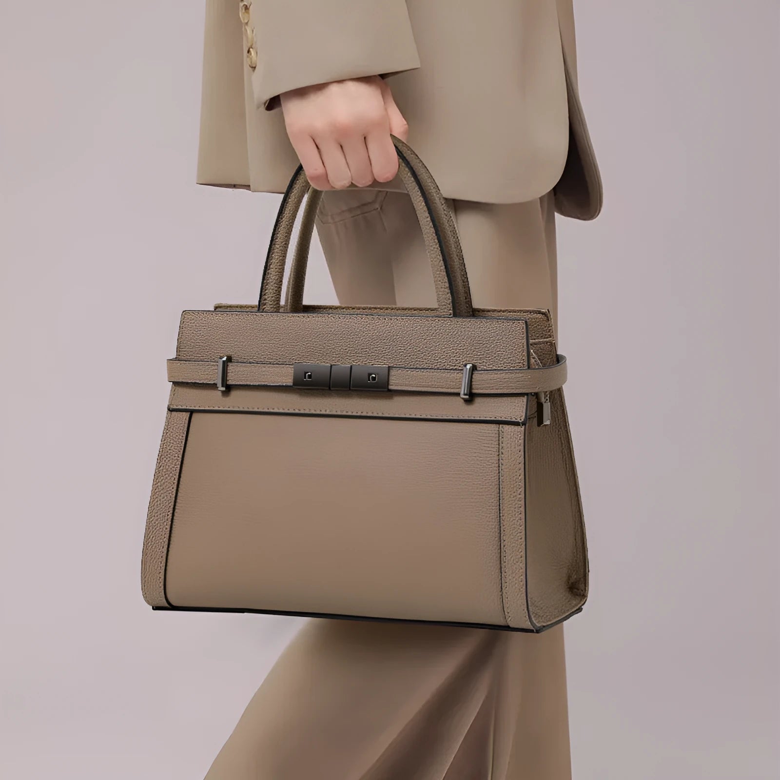 Women's genuine leather crossbody bag in horizontal square shape with clamshell opening showing internal organisation pockets