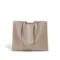 Brown genuine leather one shoulder handbag with horizontal square shape showing multiple internal compartments