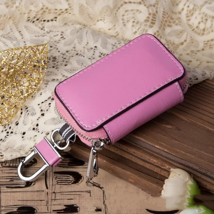 White genuine leather car key case with a plain weave pattern, shown in a square vertical design.