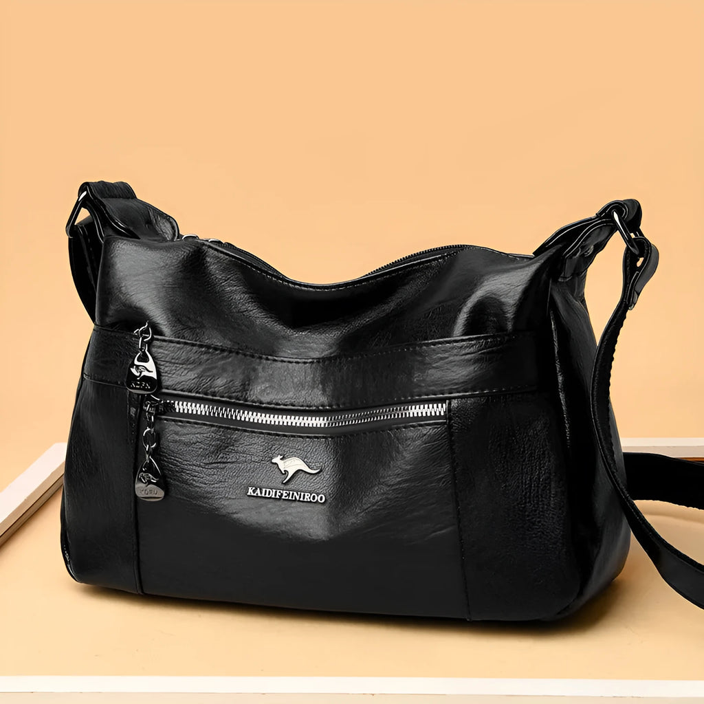 Single-shoulder women's bag in PU with soft build, urban minimalist style, shown in black, yellow, gray, red, green, blue, or purple