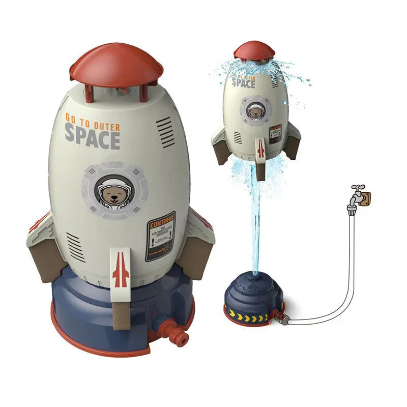 Water pressure powered rocket launcher toy with rotating sprinkler for outdoor garden use