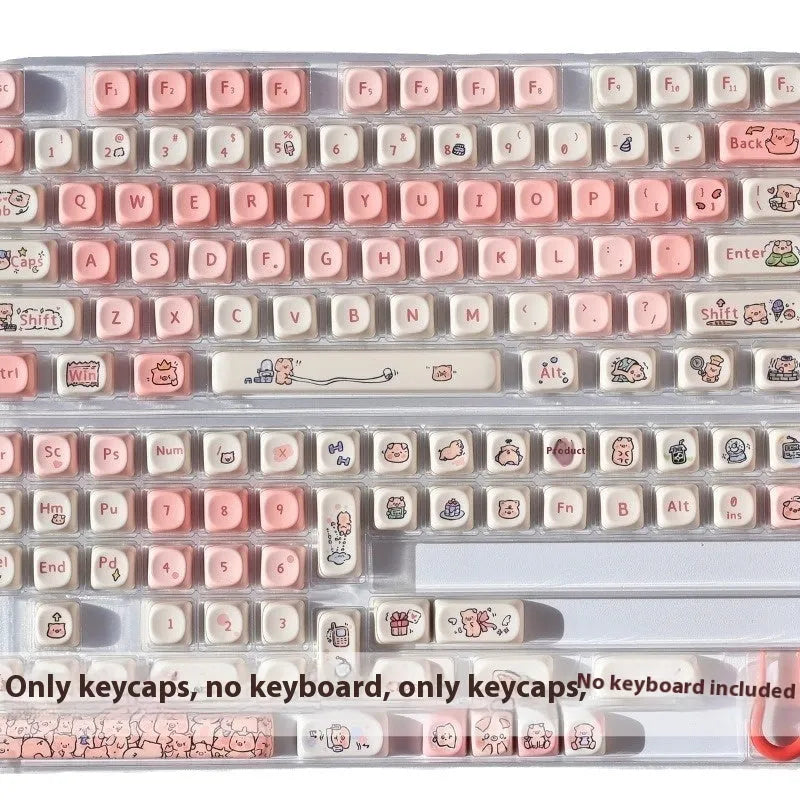 Pink PBT key cap with fragrant pig design on all five sides, shown with keycap puller tool
