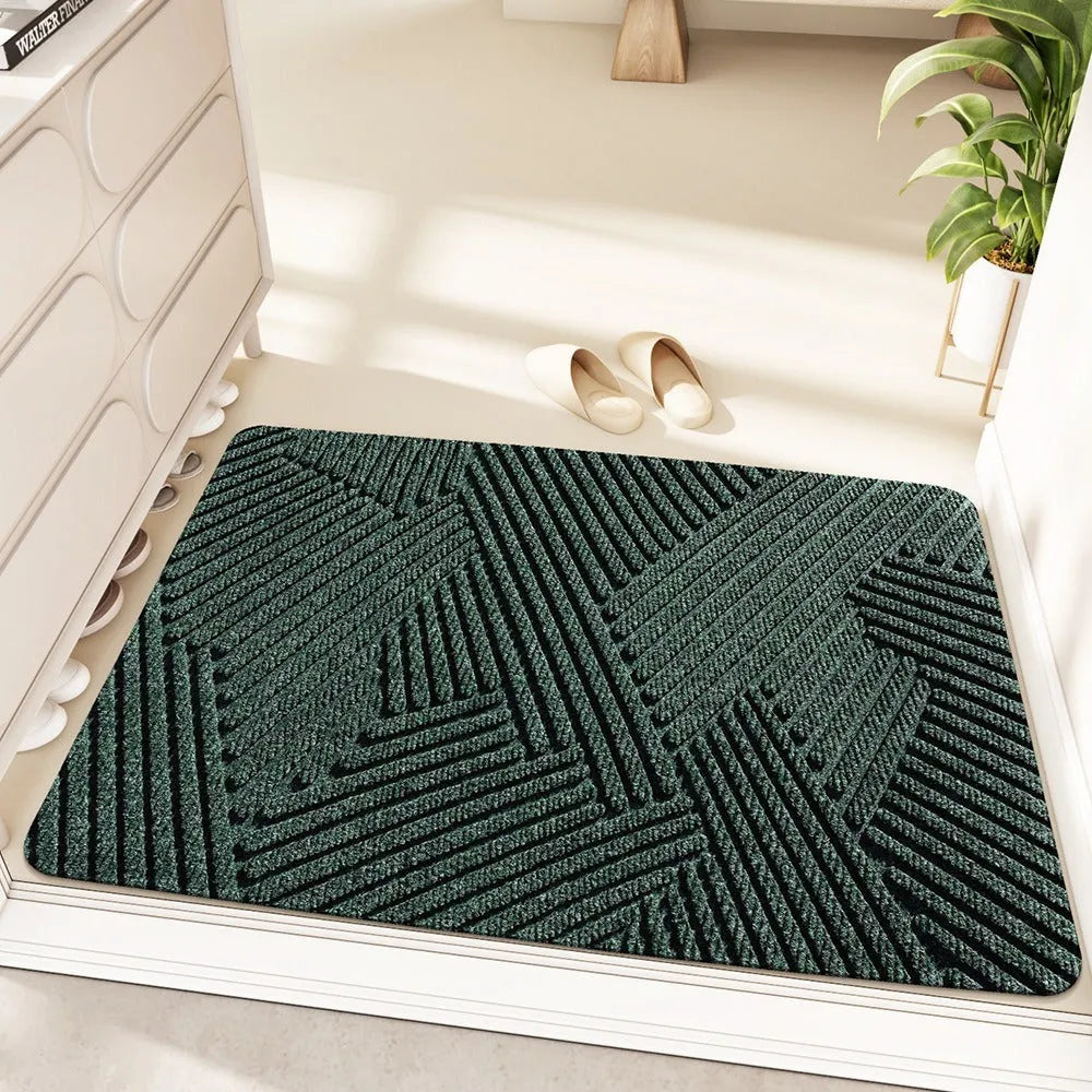 Green alien-shaped diatom oil entrance floor mat with cartoon anime pattern, measuring 60 by 90 cm.