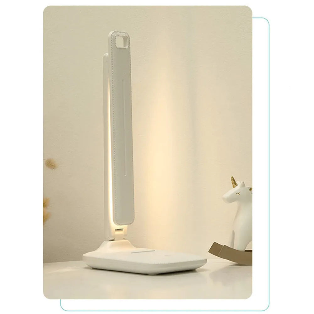 White USB rechargeable bedside lamp with touch dimming controls for children's bedroom