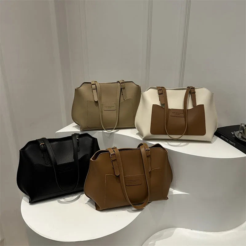 Women's structured PU tote bag in a horizontal square shape with double shoulder straps, shown in a neutral colour.