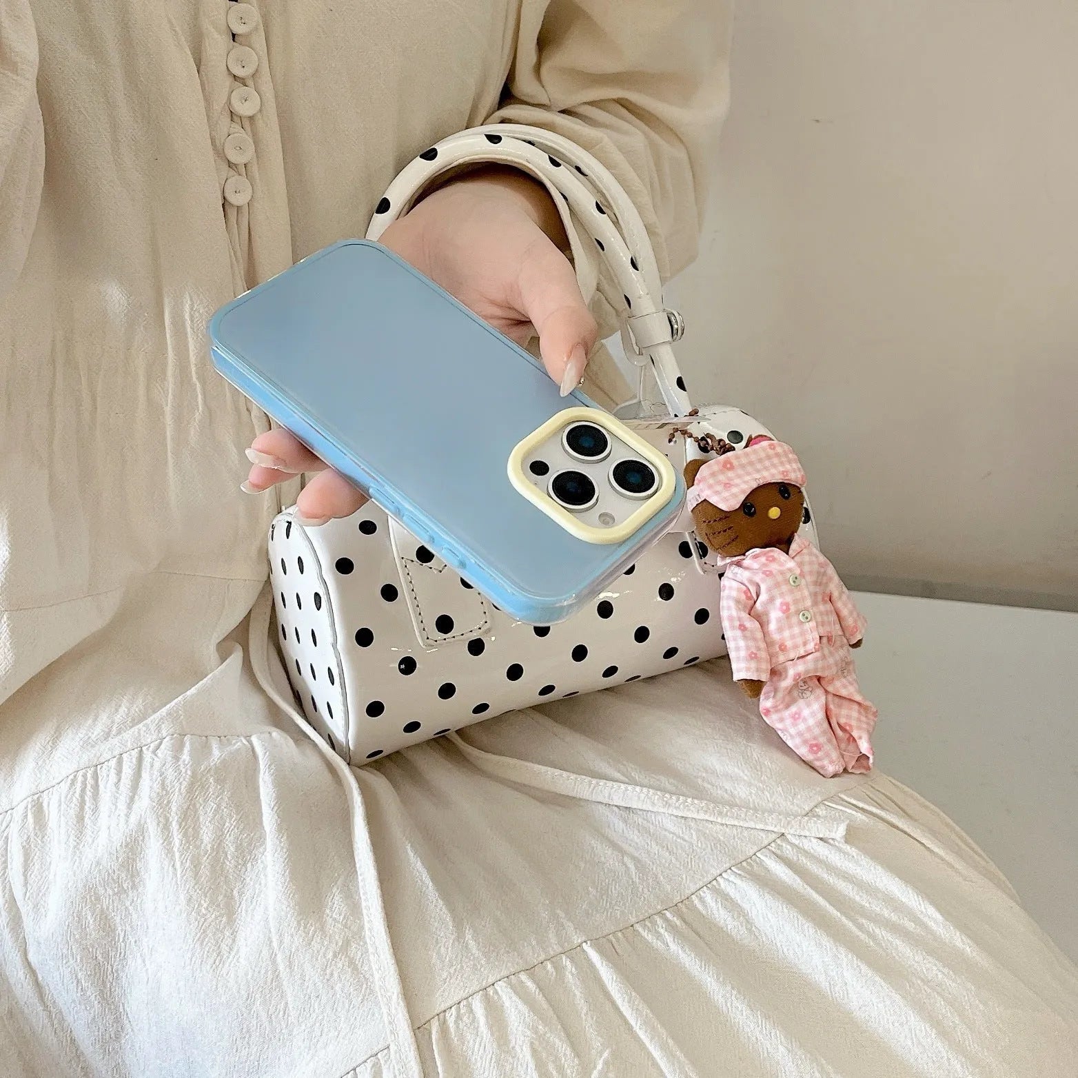 Simple solid colour jelly TPU phone case for iPhone, shown in blue, white, and yellow.
