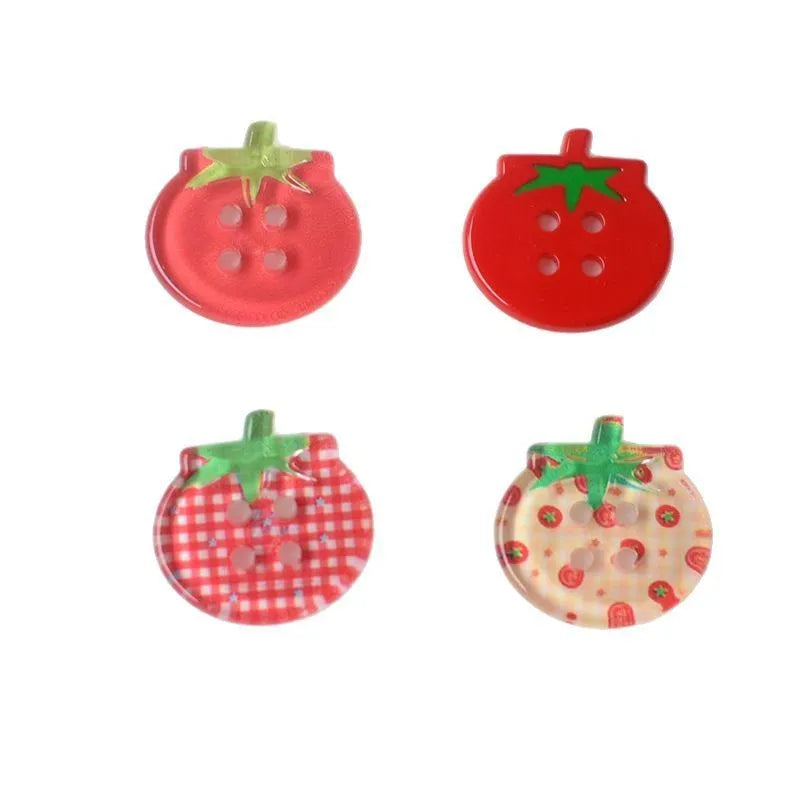 Plastic tomato button ornaments in cherry tomato printing, red plaid, solid red, and mixed colour designs