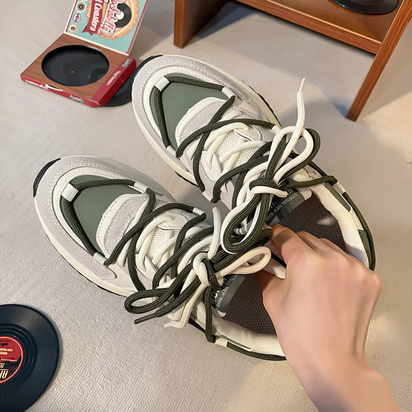 Men's and women's retro platform sneakers in banana green with suede upper, cross strap, and lace-up closure