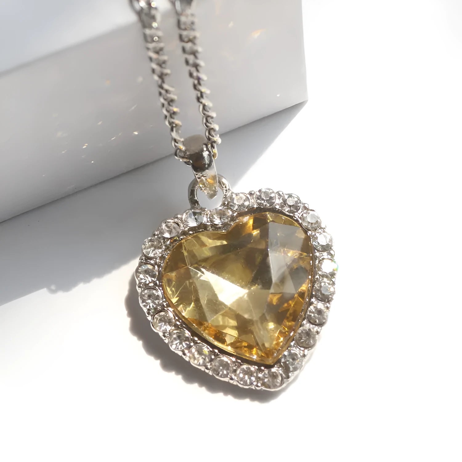 Love Sweater Chain Crystal Heart Necklace alloy electroplated retro heart pendant with adjustable 21-50cm chain in champagne colour
