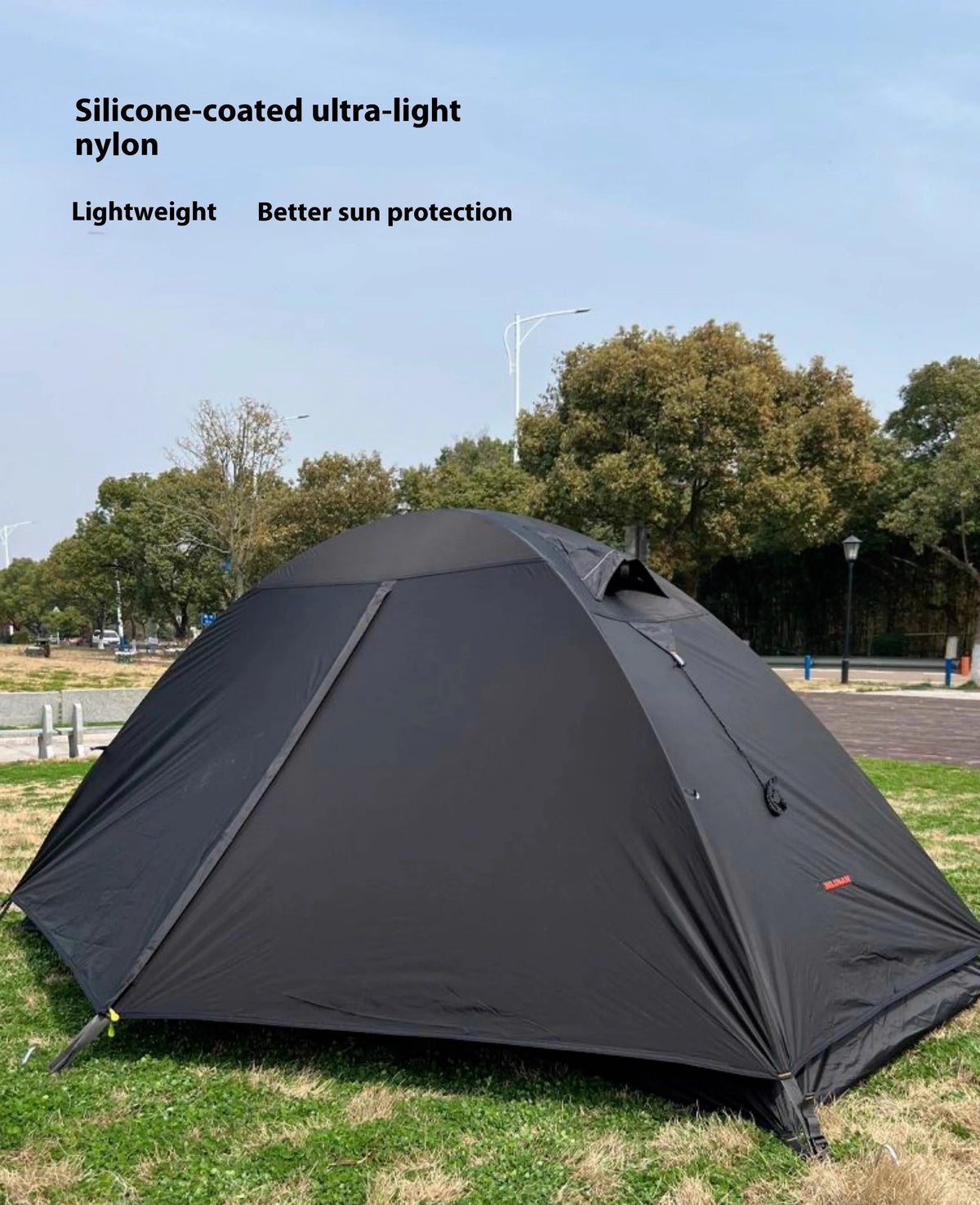 Single person tent in orange with aluminium poles and double-layer waterproof design for camping