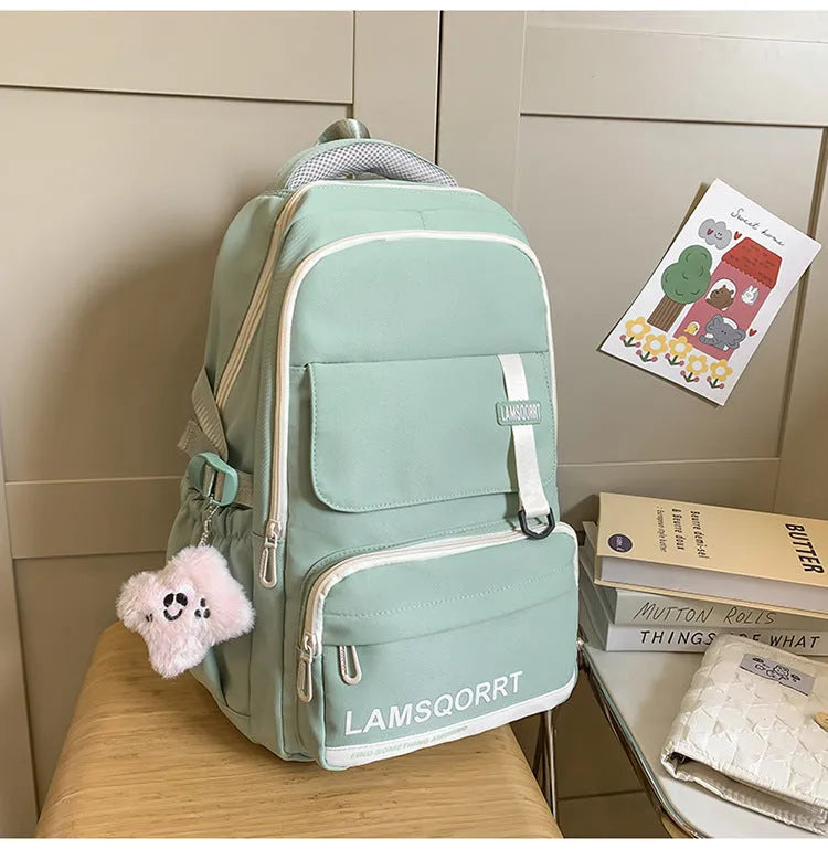 High school student backpack in waterproof nylon with curved shoulder straps and under 20L capacity