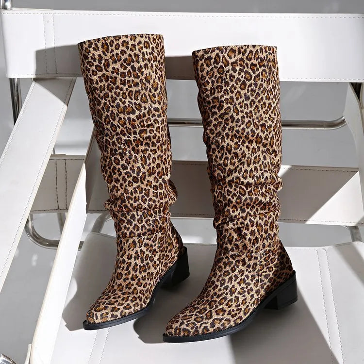 Brown leopard print women's winter boots with a chunky square toe and mid-height heel on a white background.