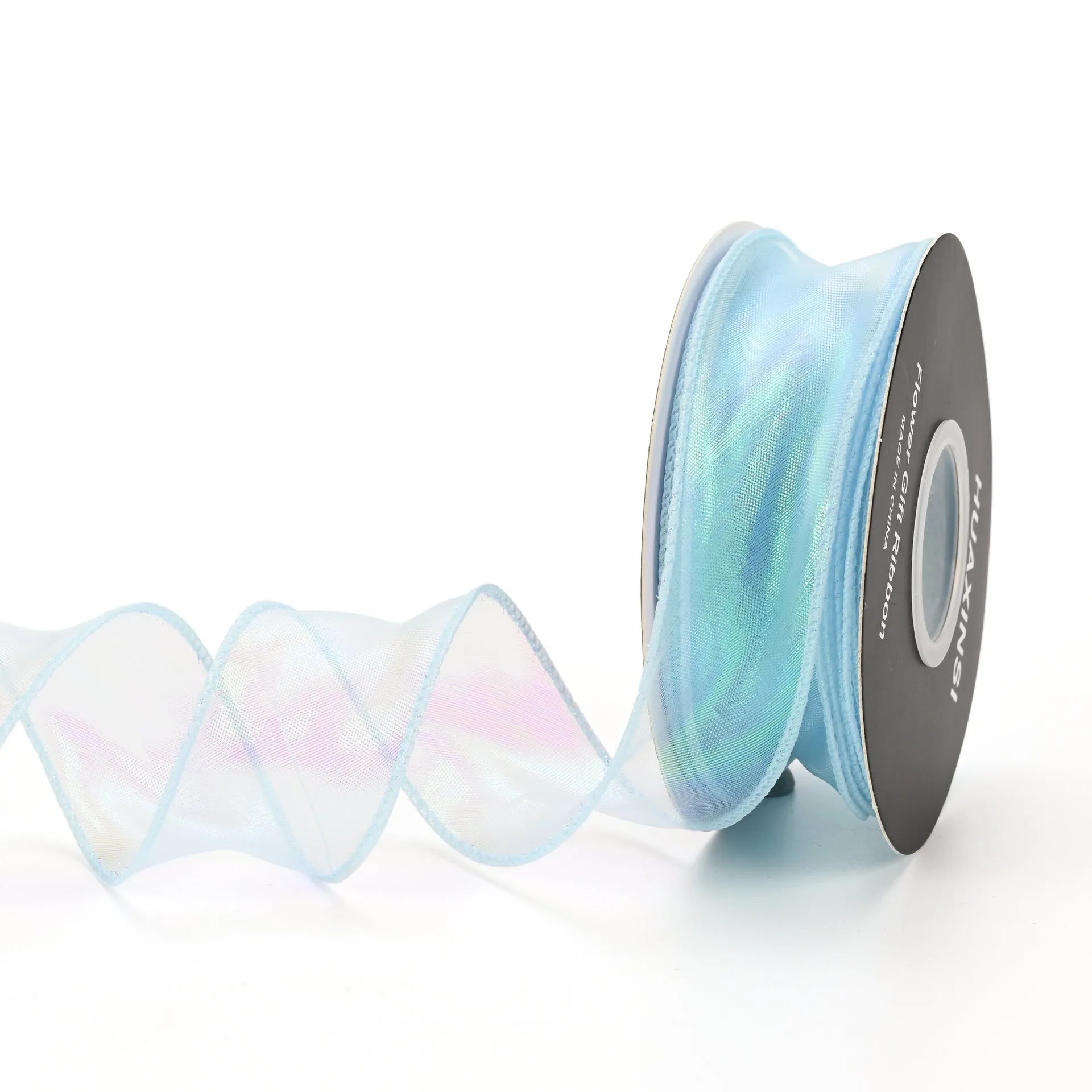 Roll of colourful fishtail yarn mesh decorative ribbon showing wave texture and multiple colour options