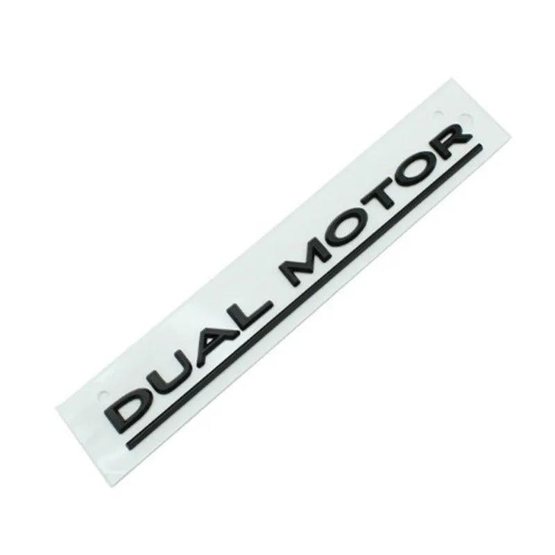 Tesla Model 3 double motor bumper sticker in ABS plastic, 19 cm by 3 cm, showing colour options.