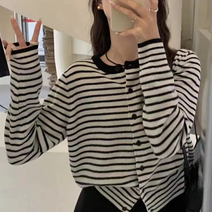Women's dark grey and white striped viscose cardigan sweater with long sleeves, shown as a slim-fit short-length top.