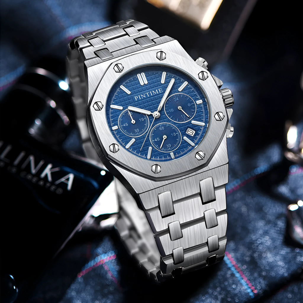 Silver multifunctional six-pin business casual quartz watch with alloy strap, 41.5mm dial, and mineral glass mirror on a flat surface