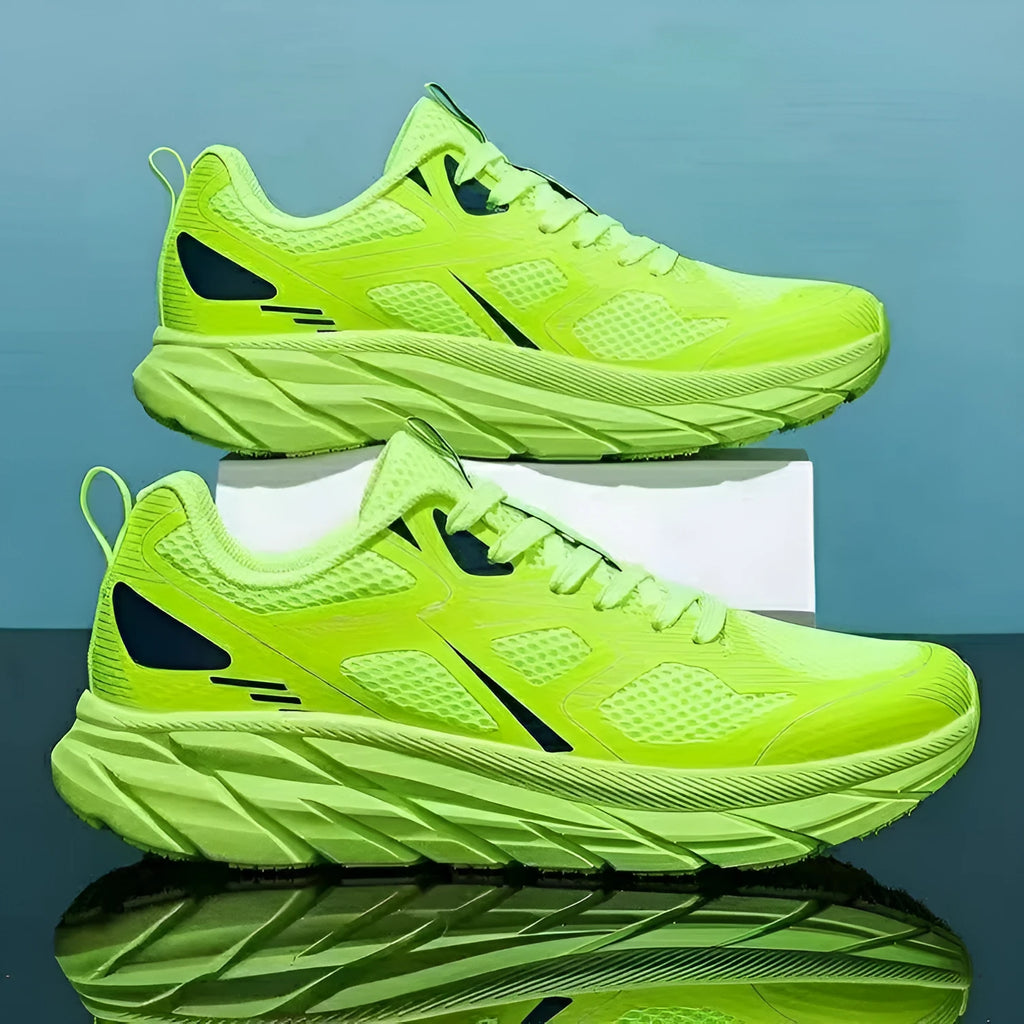 Breathable mesh casual running sneakers in red, beige, green, grey, and black colours with round toe.