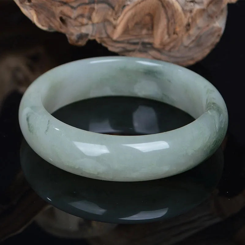 Natural Jinsi Jade Chinese style bracelet showing its solid construction on a neutral background.