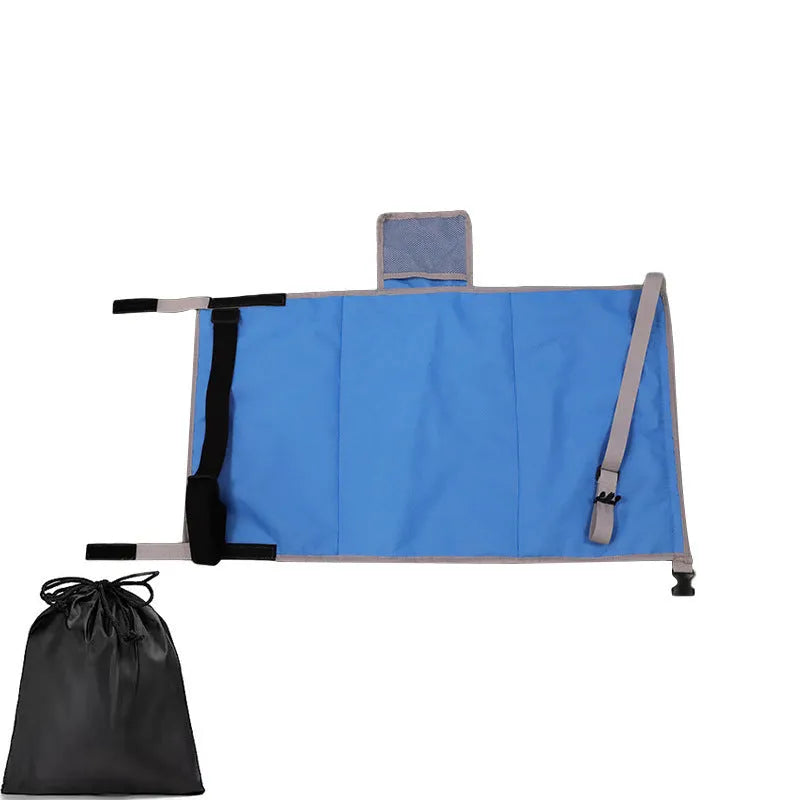 Portable blue children's aircraft seat extender with removable drawstring storage pocket folded for travel