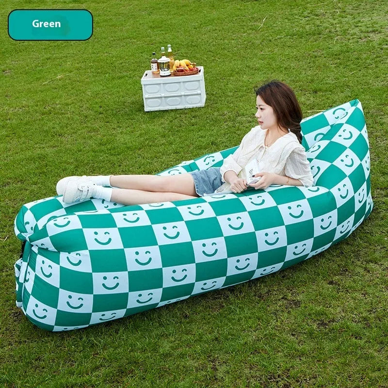 Inflatable lazy sofa in outdoor setting with colourful design options
