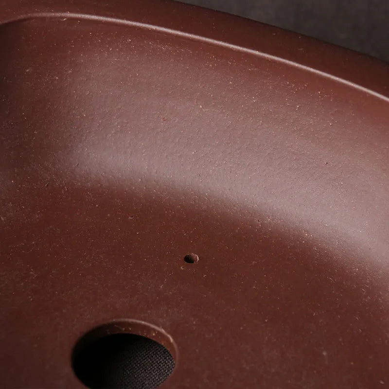 Handmade purple clay bonsai basin with classical Chinese design measuring 25cm by 20cm