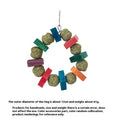 Hamster chew toy featuring applewood sticks and decorative straw balls with colourful sequins