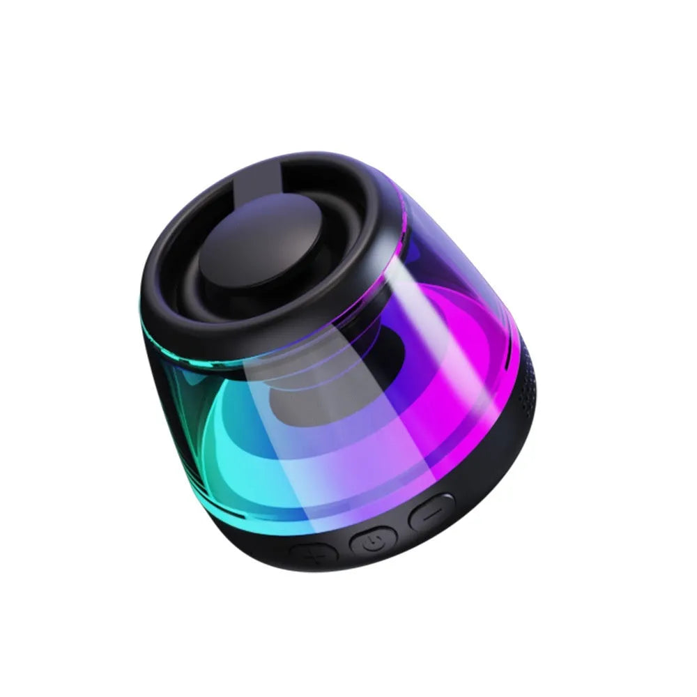 Small black or white portable Bluetooth speaker with magnetic base and card slot