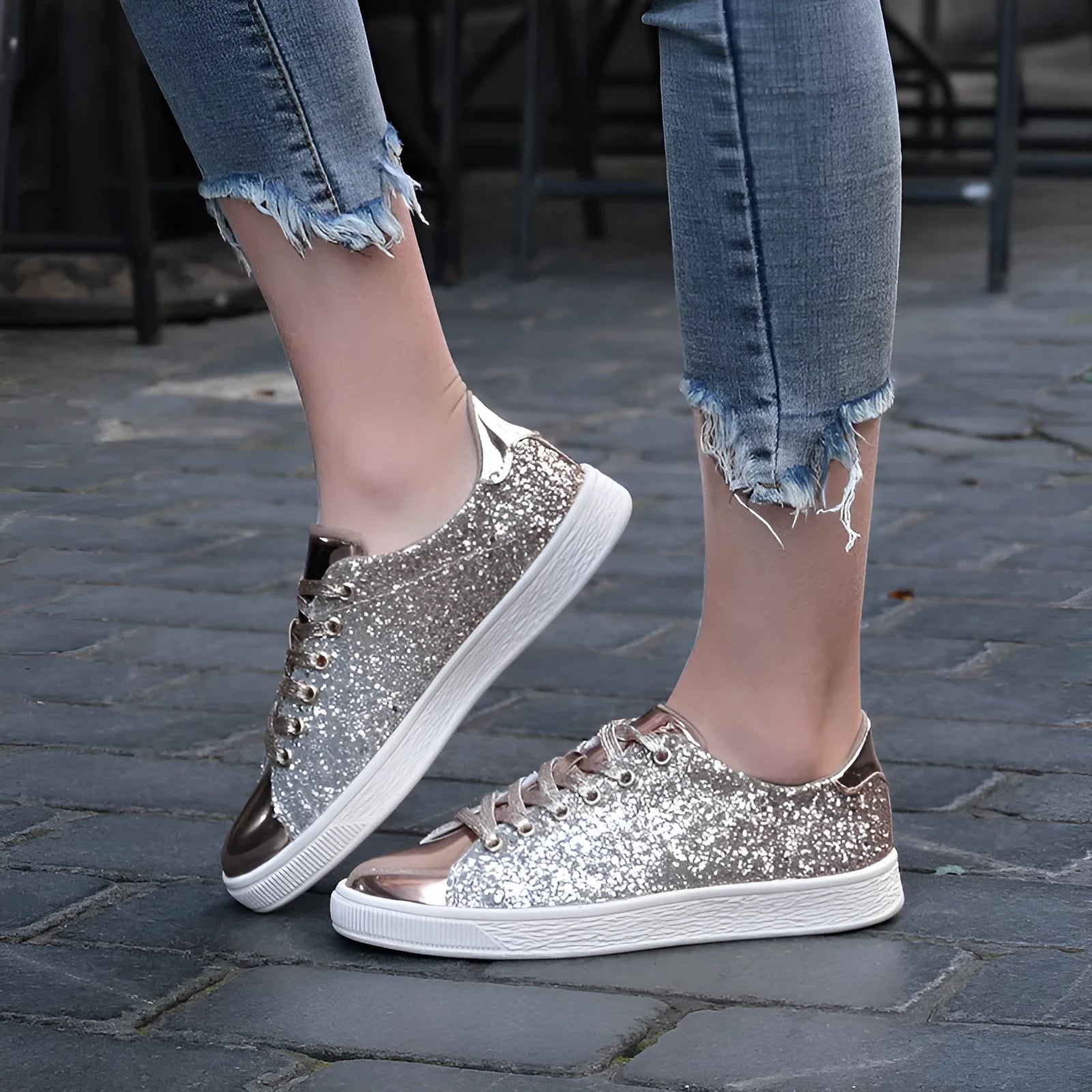 Women's black low-top lace-up shoes with glittering sequins on the upper.