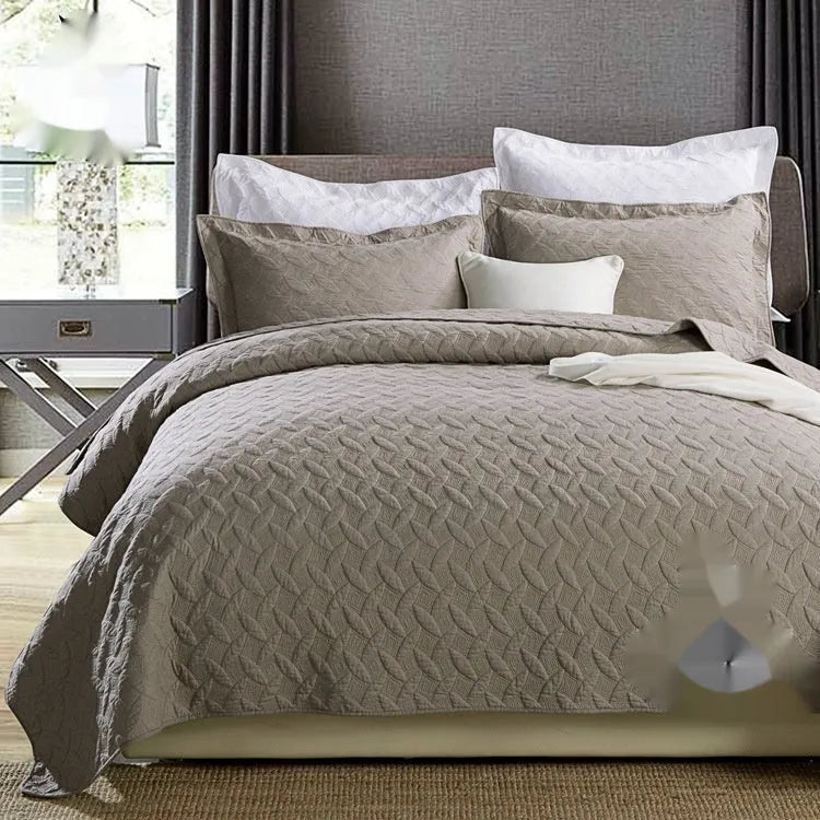 Pure cotton bed cover three-piece set shown in a light colour on a bed, featuring a quilt cover and sheet.