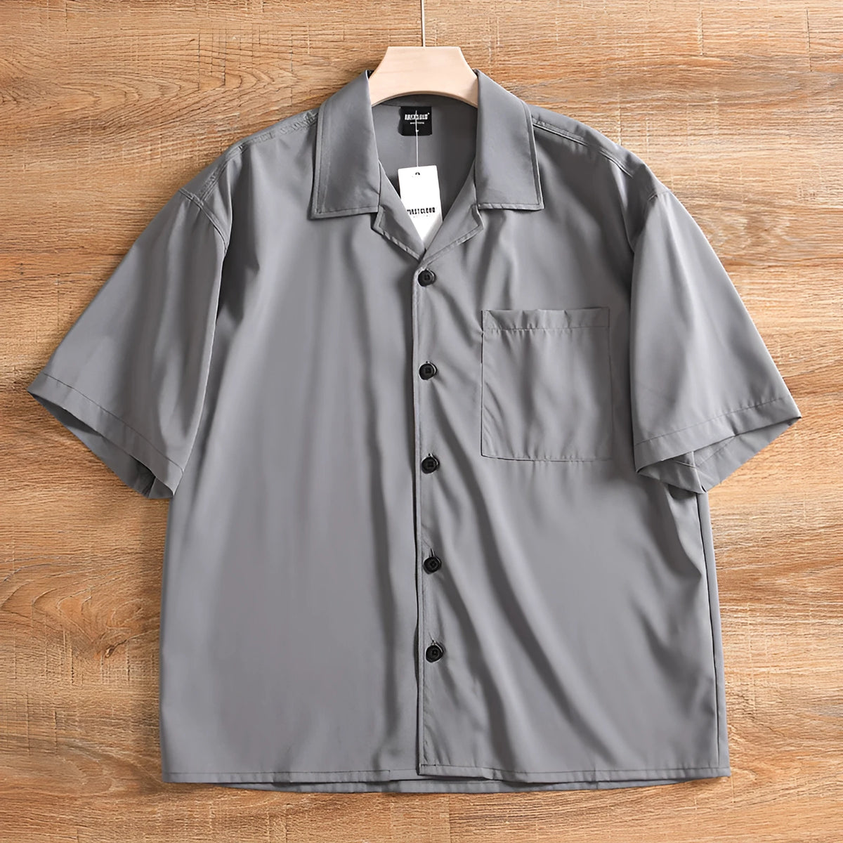 Men's lightweight loose short sleeve solid colour summer shirt in Army Green on model