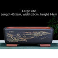 Large handmade rectangular purple clay bonsai pot in deep blue black for pine trees.