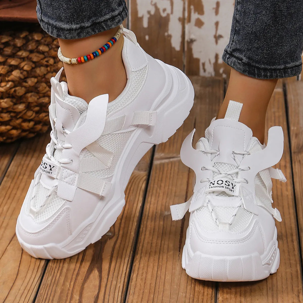 Women's purple platform mesh sports shoe with front lace-up, shown on a white background.