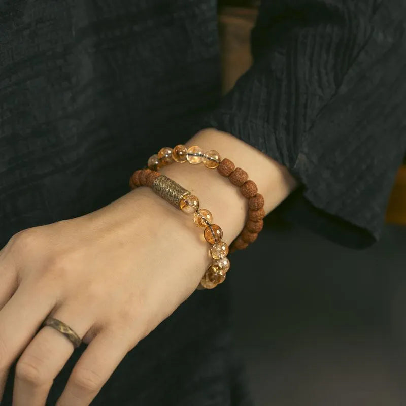 Retro-style double circle LCD bracelet showing natural citrine colour display on wrist