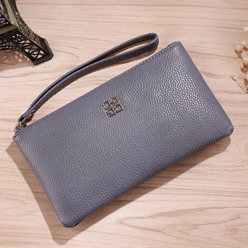 Long 55-inch PU leather zipper phone wallet handbag in solid colour with sewing line detail