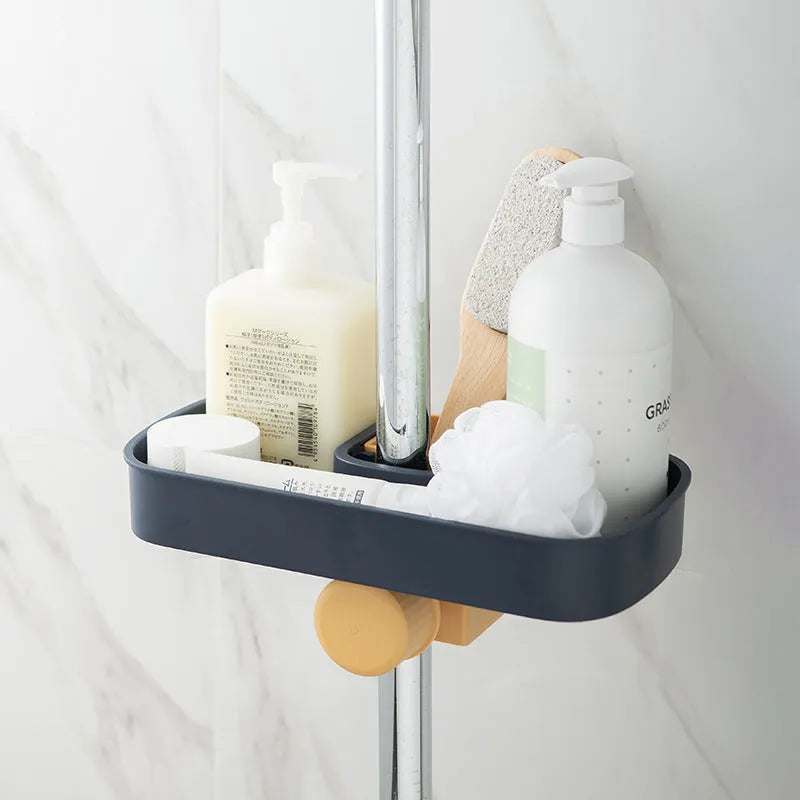 Blue sink shelf faucet holder with sponge and brush storage tray on a kitchen sink