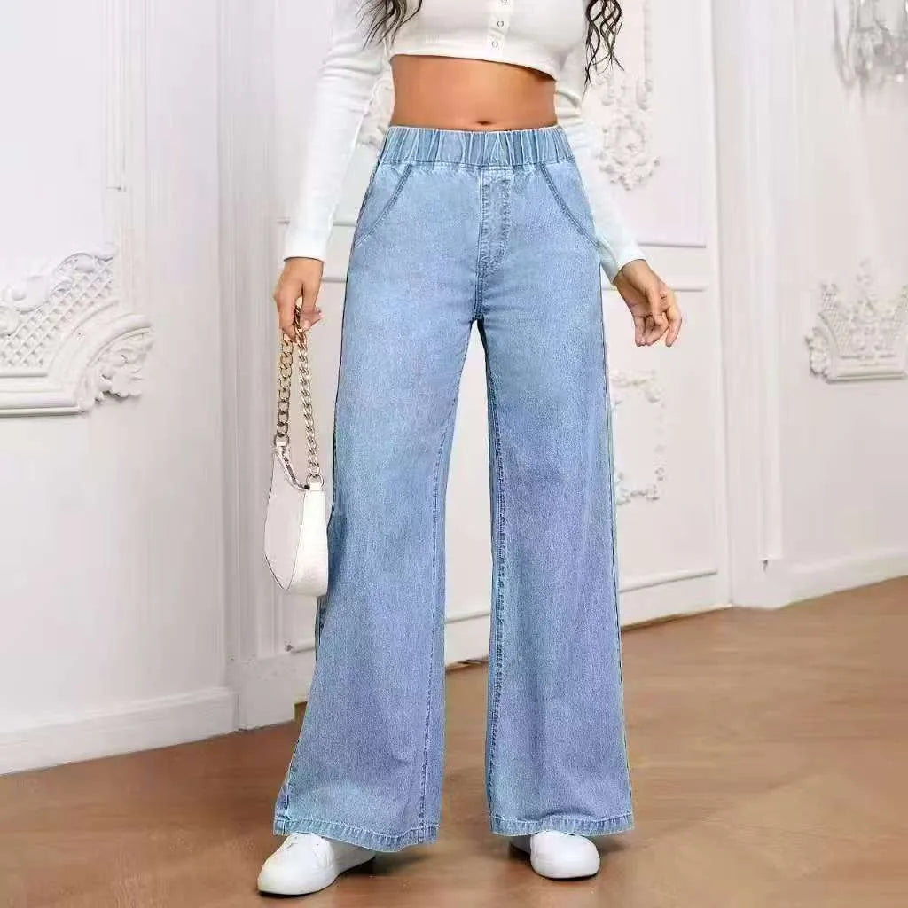 Light blue washed denim trousers with wide leg straight cut in plus sizes