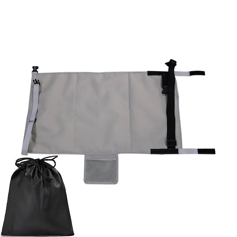 Portable blue children's aircraft seat extender with removable drawstring storage pocket folded for travel