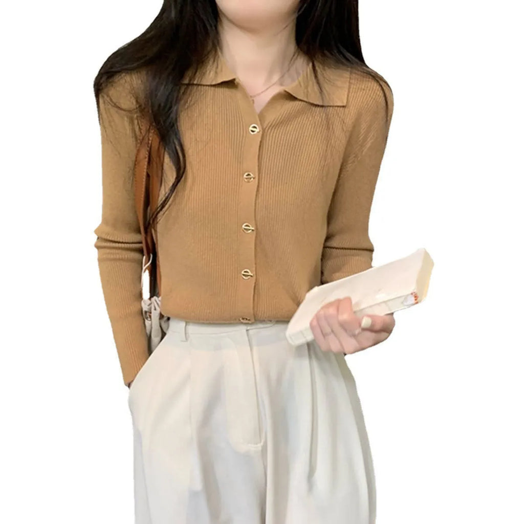 Loose fit long sleeve viscose knitted cardigan in beige, shown worn open.