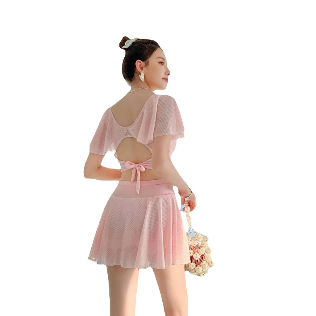 Women's solid colour two-piece skirt swimsuit in polyester and spandex fabric